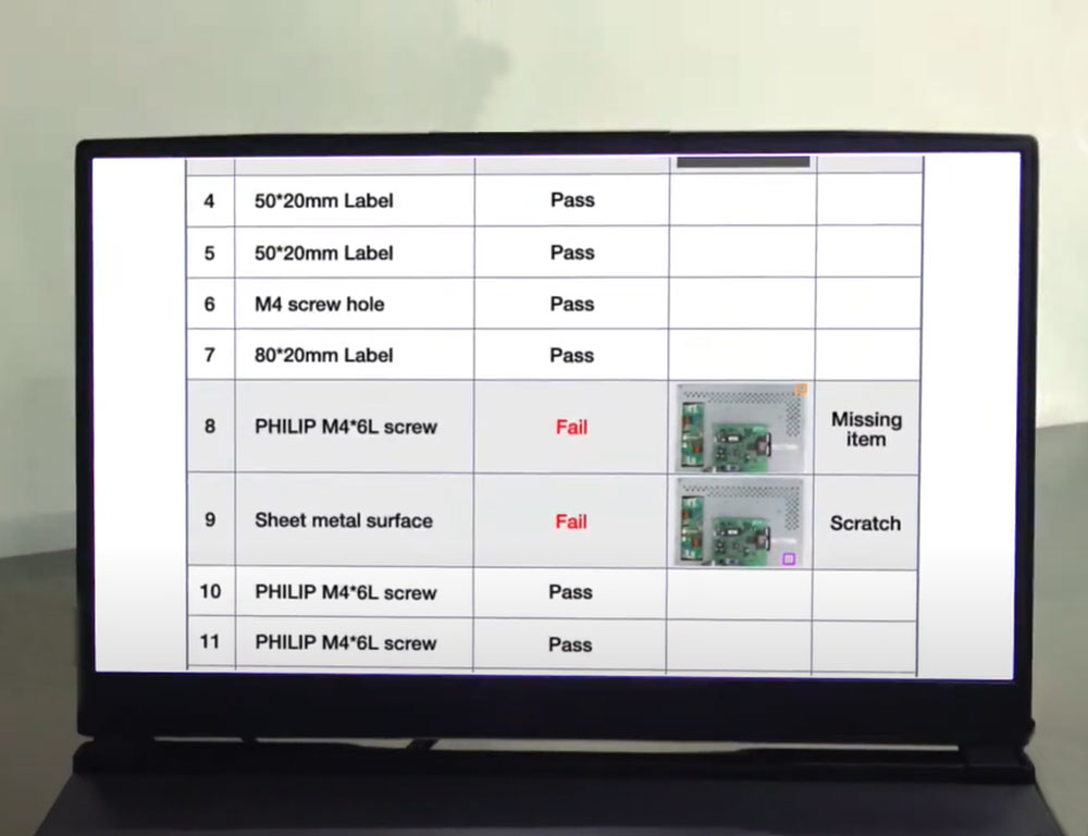 a_laptop_presents_a_detailed_recorded_inspection_report