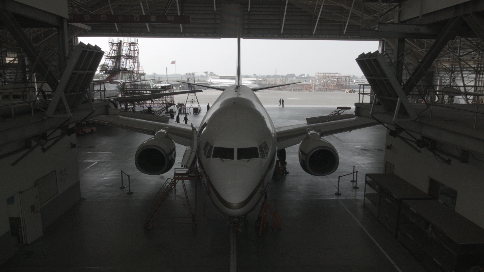 Commercial airplane parked on the airport tarmac
